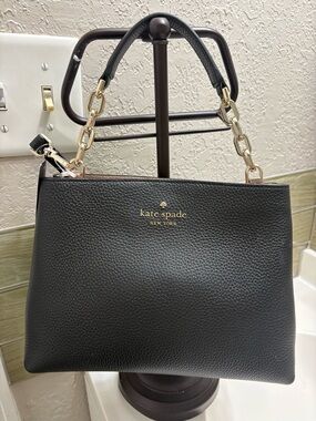 kate spade Aubrey Black Pebbled Leather Satchel pink inside.
